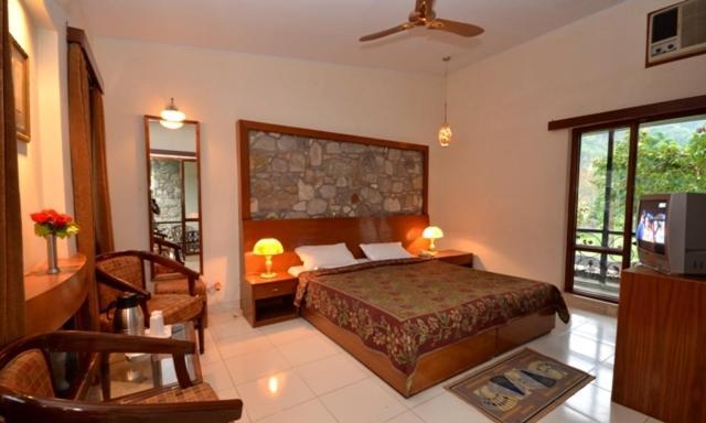 Corbett Suman Grand Hotel Corbett National Park Habitación foto